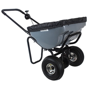 épandeur rotatif à pousser d'une capacité maximale de 45 kg, pour une largeur d'épandage de 2,5 à 3 m, pneus 10 avec chambre à a