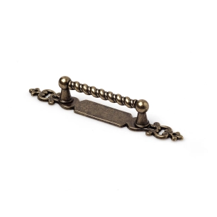 poignée de meuble type anse, modèle 1101, en zamak avec finition cuir vieilli, 64 mm, blister 4 unitès